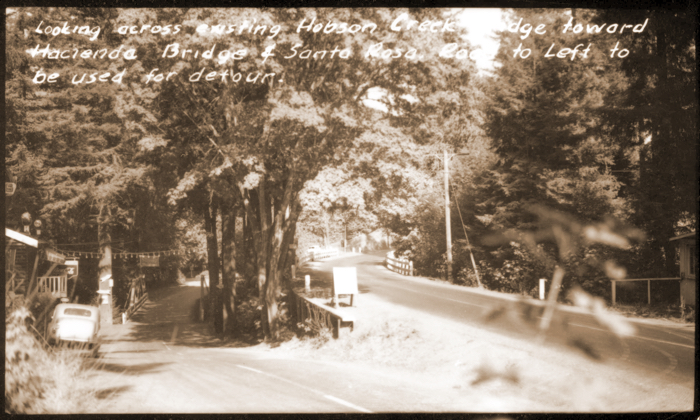 1950 Looking_across_existing_Hobson_Creek_Bridge_toward_Hacienda_Bridge_and_Santa_Rosa__road_to_left_to_be_used_for_detour